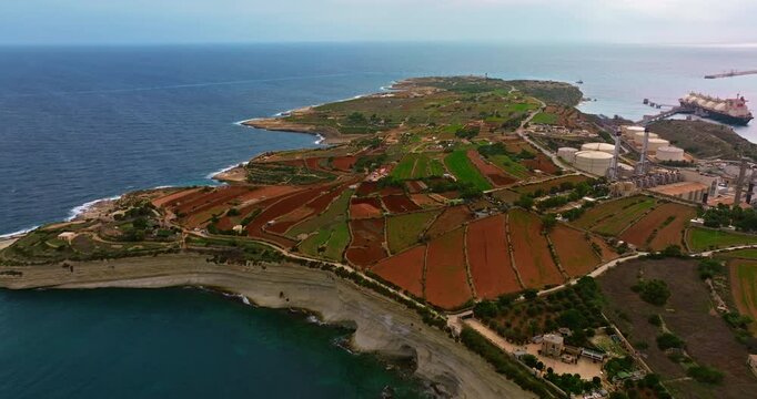 Aerial view of the Port of Marsaxlokk In Malta. A small fishing village with traditional colorful boats