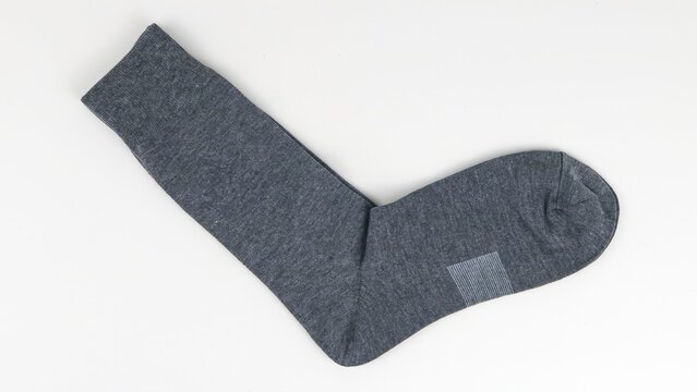 Grey socks isolated on white background