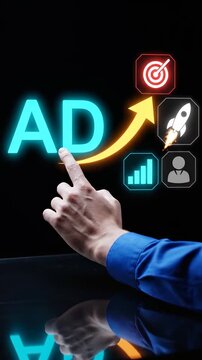 A focused hand gestures towards digital advertising elements, symbolizing the strategic approach and effectiveness of modern marketing techniques in driving engagement.