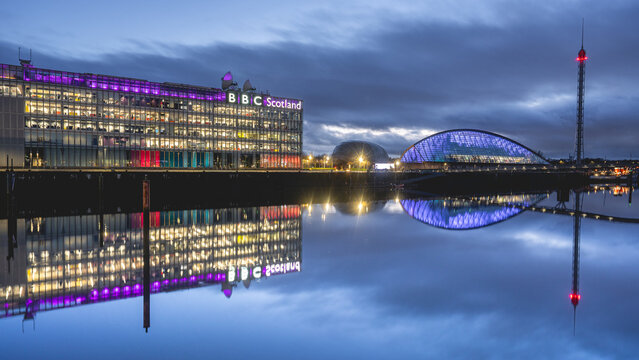 The BBC Scotland building with the lights on, at night. Glasgow, Scotland, UK.