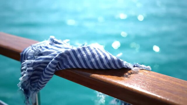 Nautical blue scarf on boat.