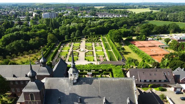 Side tracking flight along Kamp Abbey with garden parallax