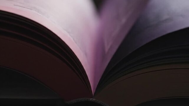 Open book with pages turn, and knowledge.