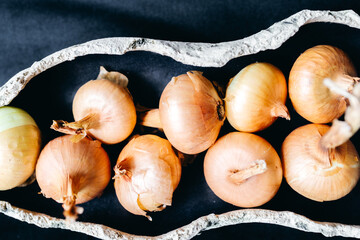 Close-Up of Freshly Harvested Yellow Onions