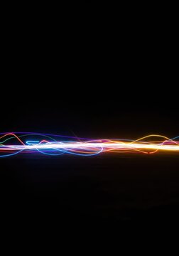Abstract glowing shapes moving across a dark field, creating colorful optical trails and psychedelic distortion, digital, form, contemporary