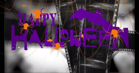 Obraz premium Displaying distressed purple HAPPY HALLOWEEN text with purple bat and orange spiders on film strips
