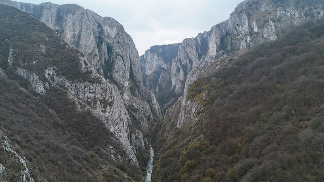 Turda gorges valley with steep rocky cliffs in romania
