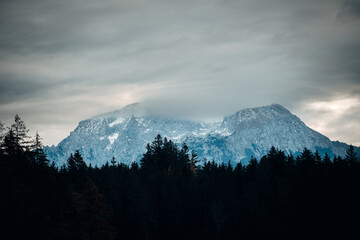 Obraz premium Breathtaking Autumn Panorama of the Alps, Aerial View of Layered Mountain Peaks and Golden Valleys in Natural Light
