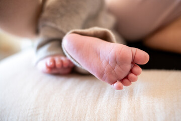 Tender Macro Shot of Newborn Baby Feet, Detailed Close-Up of Tiny Toes in Soft Natural Light