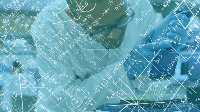 Male lab scientist after examining sample pipetting into wells for analysis, math sketches floating