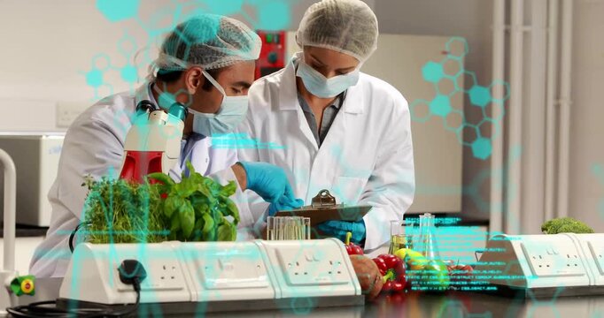 Starting tech viewing sample at scope, partner noting clipboard, cyan HUD linking data for food lab