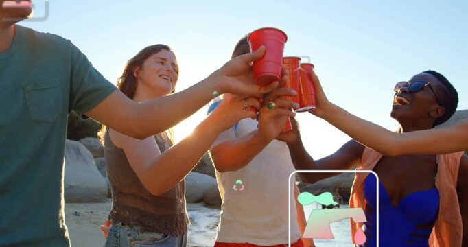 Five friends aligning red cups at sunset beach toasting while digital icons rising for marketing