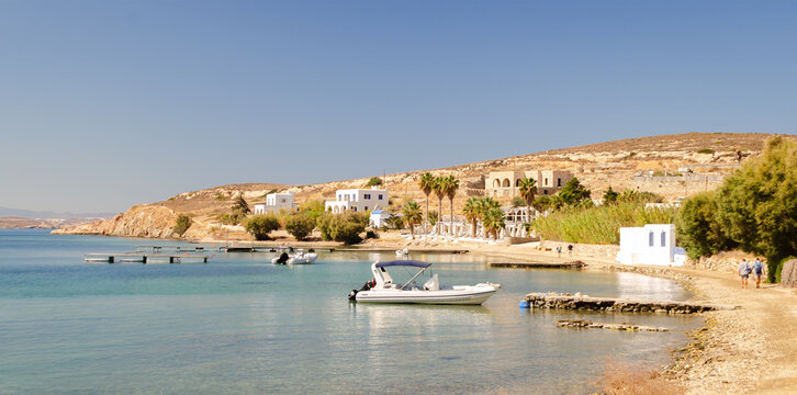 Quiet Beachfront at Livadia Beach with Boats in Paros, Greece