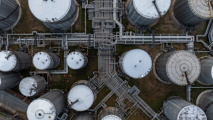 Aerial view white oil storage tank with pipeline steel, Crude oil industry, Storage fuel gas...