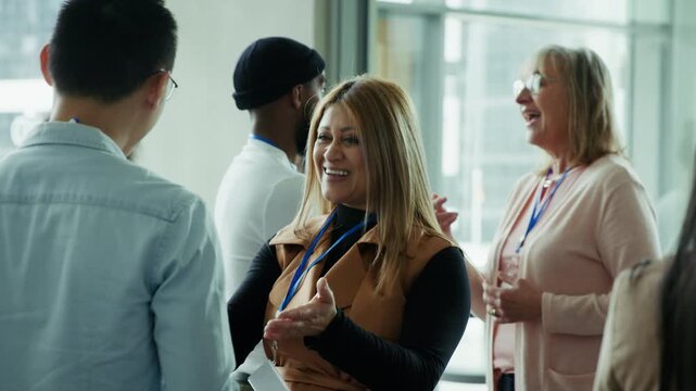 Happy people networking at a conference