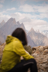 Person observing rugged mountains on baltoro trek. Baltoro