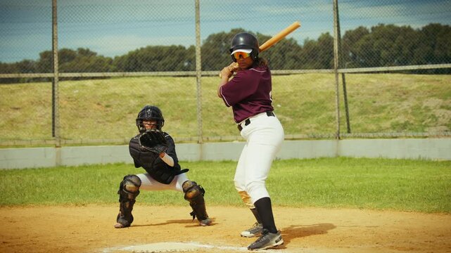 Batter and catcher ready for baseball practice