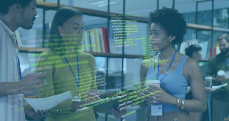 Discussing team in business casual wearing badges pointing at tablet holding documents code overlay © vectorfusionart