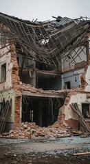 Fototapeta premium Ruined historic building with collapsed roof and scattered debris in a derelict urban scene.