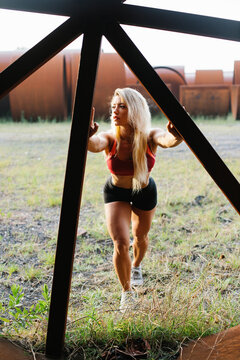 Fityoung woman stretching outdoor, Healthy fit lifestyle concept.