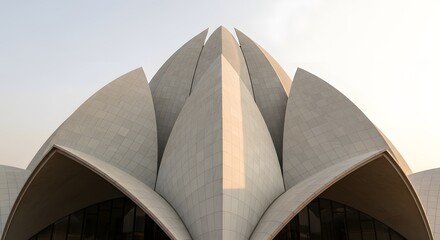 Fototapeta premium Lotus Temple architecture close-up smooth white petals abstract design geometric shape beautiful modern landmark spiritual center Delhi India