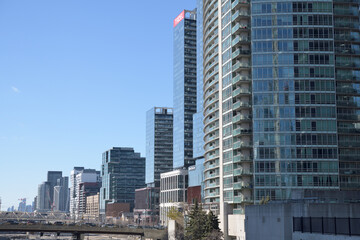 Naklejka premium buildings on the north side of Front St between Spadina Av and Bathurst St including The Well a mixed-use complex and shopping mall at 486 Front W, Toronto