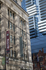 Obraz premium wall mounted banners for Metro, a supermarket chain, and Carlu, an event venue, at College Park, 444 Yonge St, Toronto (southwest corner at College St)