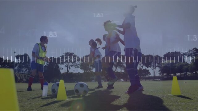 Coach gesturing left, players doing vertical jumps in sports training while overlay tracking data