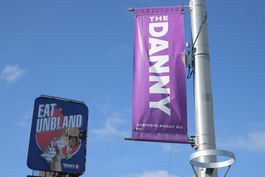 "The Danny" nickname for Danforth East BIA banner mounted to a pole, Toronto