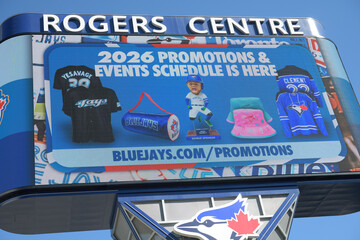 Obraz premium Rogers Centre Gardiner LED pylon sign with 2026 promotions & events schedule ad, Toronto