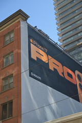 Obraz premium Rogers Communications and Apple Inc mural for iPhone17 pro at southeast corner of King St W and Spadina Av, Toronto