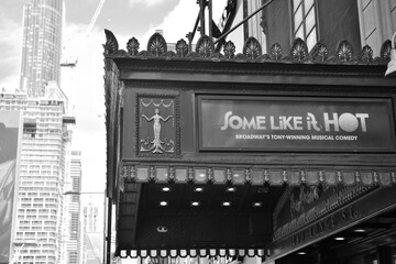 Obraz premium black and white view of canopy over entrance to CAA Ed Mirvish Theatre with sign for Some Like It Hot, 263 Yonge Street, Toronto