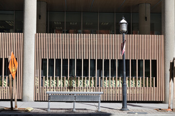 Naklejka premium abstract wood privacy screen and sign of The Joneses, a restaurant, located at 33 Yonge St, Toronto