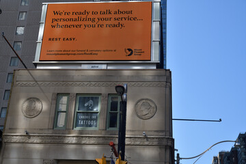 Naklejka premium rooftop billboard ad for Mount Pleasant Group above heritage property at 380 Yonge St (and above Chelsea Hotel sign), Toronto