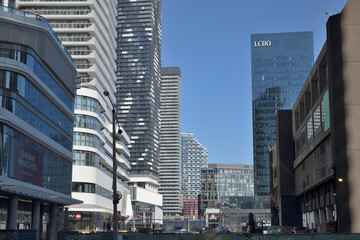 Naklejka premium looking east from Harbour St to recent residential skyscrapers and LCBO corporate offices at 100 Queens Quay E, Toronto
