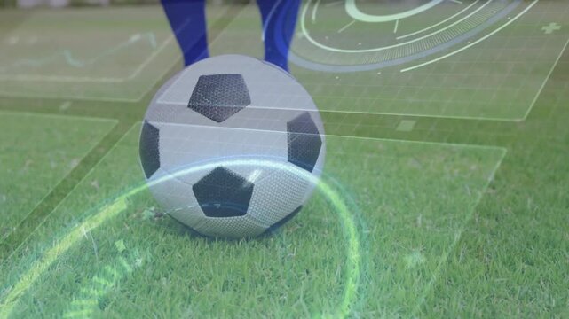Male soccer player stepping in and striking ball for sports analytics with HUD highlighting strike
