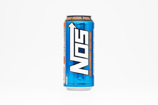 DRESDEN, GERMANY - 4. June 2025: NOS Original energy drink on a white background. Blue can with a refreshing tropical citrus flavor. 473 ml beverage import from the USA.