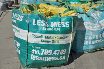 Naklejka premium large bags filled with material in Toronto (Less Mess Enviro Bag)