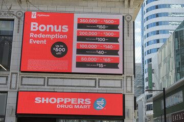 Naklejka premium digital display outside Shoppers Drug Mart at 279 Yonge St, Sankofa Square, Toronto