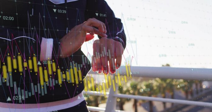 Man standing by railing tapping watch upon candlestick charts overlaying, monitoring market data