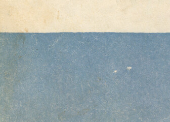 Fototapeta premium Grunge frayed blue paper background. Texture of vintage cover book.