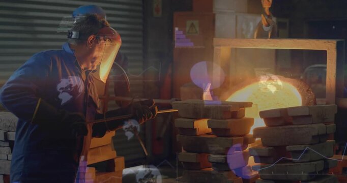 Probing senior worker after furnace glow inserting rod into forge with visor, gloves checking melt