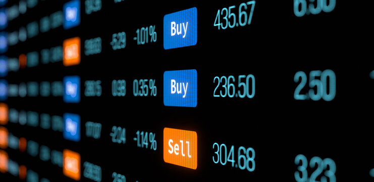 Close-up trading screen with stock market data, buy and sell information. Financial markets, invest, stockbroker, financial figures, up and down, volatile.