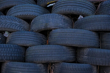 pile of black car tyres