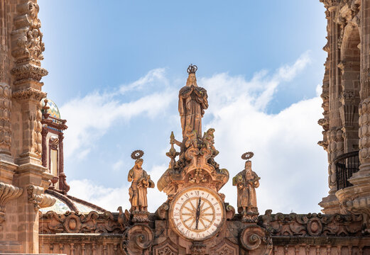 Clock and Sculptures Detail of Santa Prisca Church in Taxco Mexico
