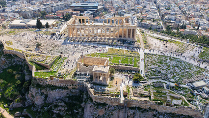 Naklejka premium Aerial drone photo above Acropolis hill and the Parthenon featuring Propylaea and porch of the Caryatids, Athens historic centre, Attica, Greece