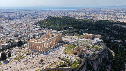 Naklejka premium Aerial drone photo above Acropolis hill and the Parthenon featuring Propylaea and porch of the Caryatids, Athens historic centre, Attica, Greece
