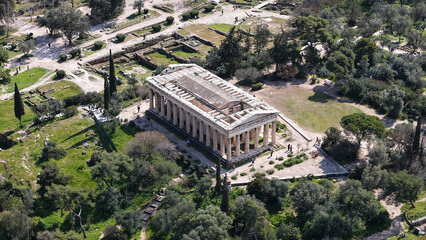 Naklejka premium Aerial drone photo of iconic Temple of Hephaestus in Ancient Agora of Athens historic centre built below Acropolis hill , Attica, Greece