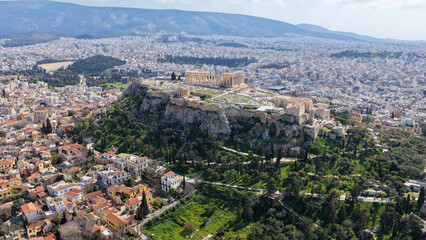 Naklejka premium Aerial drone photo above Acropolis hill and the Parthenon featuring Propylaea and porch of the Caryatids, Athens historic centre, Attica, Greece