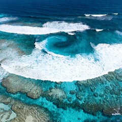 Obraz premium An aerial view shows a powerful ocean whirlpool swirling over a coral reef.